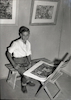 צייר בן 14- עמוס ישכיל ליד ציוריו