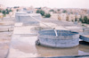 חידוש אספקת המים לירושלים: צינור מים על גג בית מגורים – הספרייה הלאומית