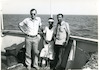 מימין לשמאל: זיענה ברהני, אישה בת העדה האתיופית ודוד בן עוזיאל על סיפון אוניית 'בת גלים'.