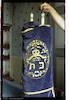 Photograph of: Torah scroll with mantle.