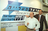 Natan Sheranski showing to the press the new symbol of his political party Alyia, towards the fortcoming elections" – הספרייה הלאומית