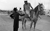 East Jerusalem Landscape, A policeman riding a horse meeting his orthodox friend – הספרייה הלאומית