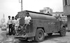 As the city's water pipes were damaged following the war, the Sidon municipality distributing drinking water by tankers to the local population – הספרייה הלאומית