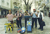 To the benefit for the passers by, a popular musician group perform on the Jerusalem walking street.