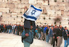Religious right wing members, celebratad the regular Friday pray at the Western Wall with dance and song.