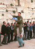 Religious right wing members, celebratad the regular Friday pray at the Western Wall with dance and song.