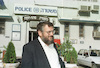 Beni Alon leaving the Police crime squad after being investigated for his illegal activities.