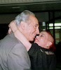 Following the Oslo agreementin Washington the Foreign Min. Shimon Peres receive a kiss from a supporter.