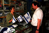 Citizens of Israel prepare themselves to celeebrate the Nations 45th Independence Day buying flags for their cars or to put on the window.