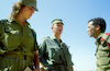 Girl soldiers teaching male soldiers the military warfare – הספרייה הלאומית