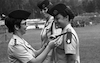 CO Women Corps Dvora Tomer placing the newly graded girl soldiers who will shortly instruct male new recruits.