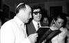 A religious ceremony for the birth of the son of blind invalid holding by the family whit the presence of guests and Rabbi Shmuel HaCohen Avidor – הספרייה הלאומית