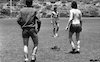 Three Manchester United soccer players work out at Wingate Institute last Saturday, training for their game with a Tel Aviv selected tomorrow, while teammate George Best lives if up on a Spanish beach – הספרייה הלאומית