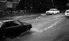 Cars splash through Tiberia's flooded roads during the recent rain storms – הספרייה הלאומית