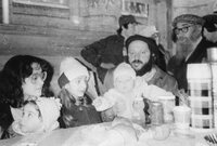Leningrad, 1987. At the Sukkah. From left to right: Avrom-Aba Ejzlin, Grigory Vasserman (with the child on his hands).
