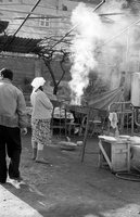 Samarkand, 1992. Mahalla. Plov cooking.