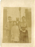 Group photo: old men, man, women, and girl.