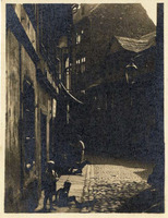 Street scene: women and playing infants.