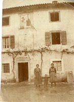 Madonna della Salute, two women and a child in front of a farm, 16 Nov 1917.