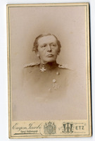 Portrait of a clean-shaven, senior and decorated military officer (late 19th century).