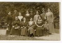 Group portrait in Bad Brückenau of nine women, three men and a small boy. Late 19th century.