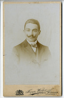 Portrait of a man, "Schmidt"?, with handlebar mustache. Late 19th century.