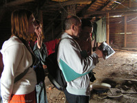 Photograph of: Synagogues in Lithuania: A Catalogue Project team documenting the wooden synagogue in Troškūnai.