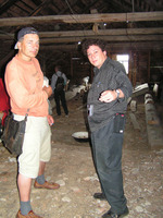 Photograph of: Synagogues in Lithuania: A Catalogue Project team documenting the wooden synagogue in Troškūnai.