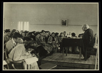 Na'an - Yitzhak Tabenkin, founder of the socialist movement in Israel, teaches a lesson to youth at OSE's house.