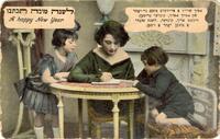 Writing a Rosh Hashanah greeting card.