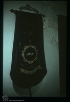 Photograph of: Banner of Societatea Isralita de Ajutorul Medical (Ezrt ahim) in Turnu Severin.