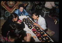 Photograph of: Aminov house in Bukhara : Guest room: Workshop of Bukharian embroidery.