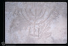 Photograph of: Ancient tombstone with Hebrew inscription and incarved menora in the Archeological Museum in Durrës : sanctuary implements.