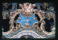 Photograph of: Tevah in Tempietto Piccolo Small Prayer Hall in Tempio Grande (Great Synagogue) in Turin : Octagonal Reader's Desk, top inscription - Isa. 24:15.