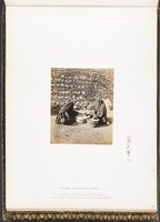 Women Grinding Corn