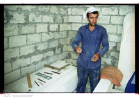 Photograph of: Stone carving workshop in the Muslim cemetery.