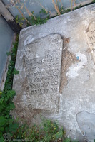 Photograph of: Women's ohel in the New Jewish Cemetery in Medzhybizh : Tombstone of Tziporah Gitel, daughter of R. Israel Shalom Yosef in the Ohel.