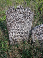 Photograph of: New Jewish Cemetery in Medzhybizh : Tombstone of Yitzhak Meir, son of Yehiel Michel, grandson of Rabbi Barukh etc.