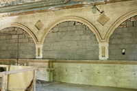 Photograph of: Great Synagogue in Oshmiany - Prayer Hall - Western Wall : Arches with sunken decoration.