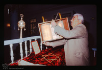 Photograph of: Torah reading in the Kal Yavanim (Greca) Synagogue in Trikkala, Greece : Showing the Torah.