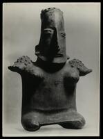 Photographs of Mexican clay figurines.