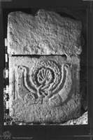 Photograph of: The Menorah sarcophagus from Beth She'arim.