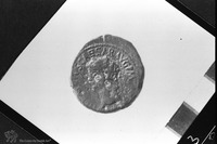 Photograph of: Coins of the Roman Administration in the days of Agrippa II : Obverse: Head of Claudius;(Reverse: The three children of emperor Claudius).