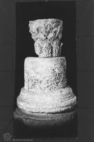 Photograph of: Architectural fragment : Corinthian capital atop base.