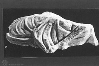 Photograph of: Beth Shearim, A marble fragment of a Human figure.