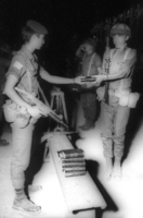 With the end of the recruit exercises, soldiers receiving a Bible book after swearing ceremony at the Western Wall.