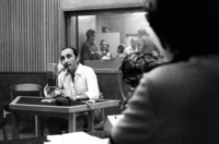 Entertainer Ehud Manor in his radio night performance interviewing impressario Giora Godik.