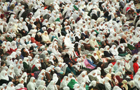 About 300,000 faithful Moslems gathered on Friday to pray the Ramadan Holiday at the Mosque of El Aksa and Omar in the old City of Jerusalem.