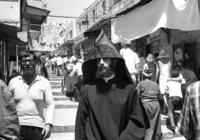 A Christian Monck walking the nerrow streets of Old Jerusalem.