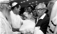Dr.Israel Sheib Eldad participating a Brith Mila ceremony.